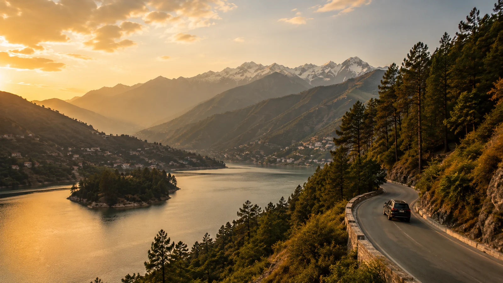 Scenic Uttarakhand mountain road beside a Himalayan lake at golden hour